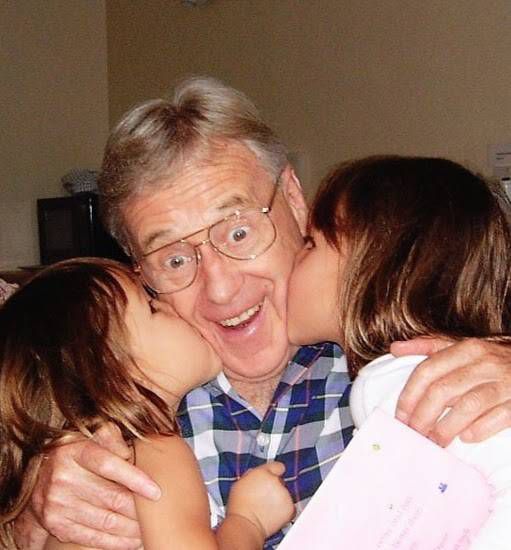 Pat with his granddaughters
